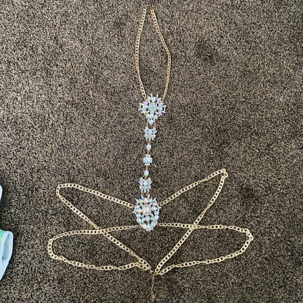 Gold body chain with rhinestone embellishments